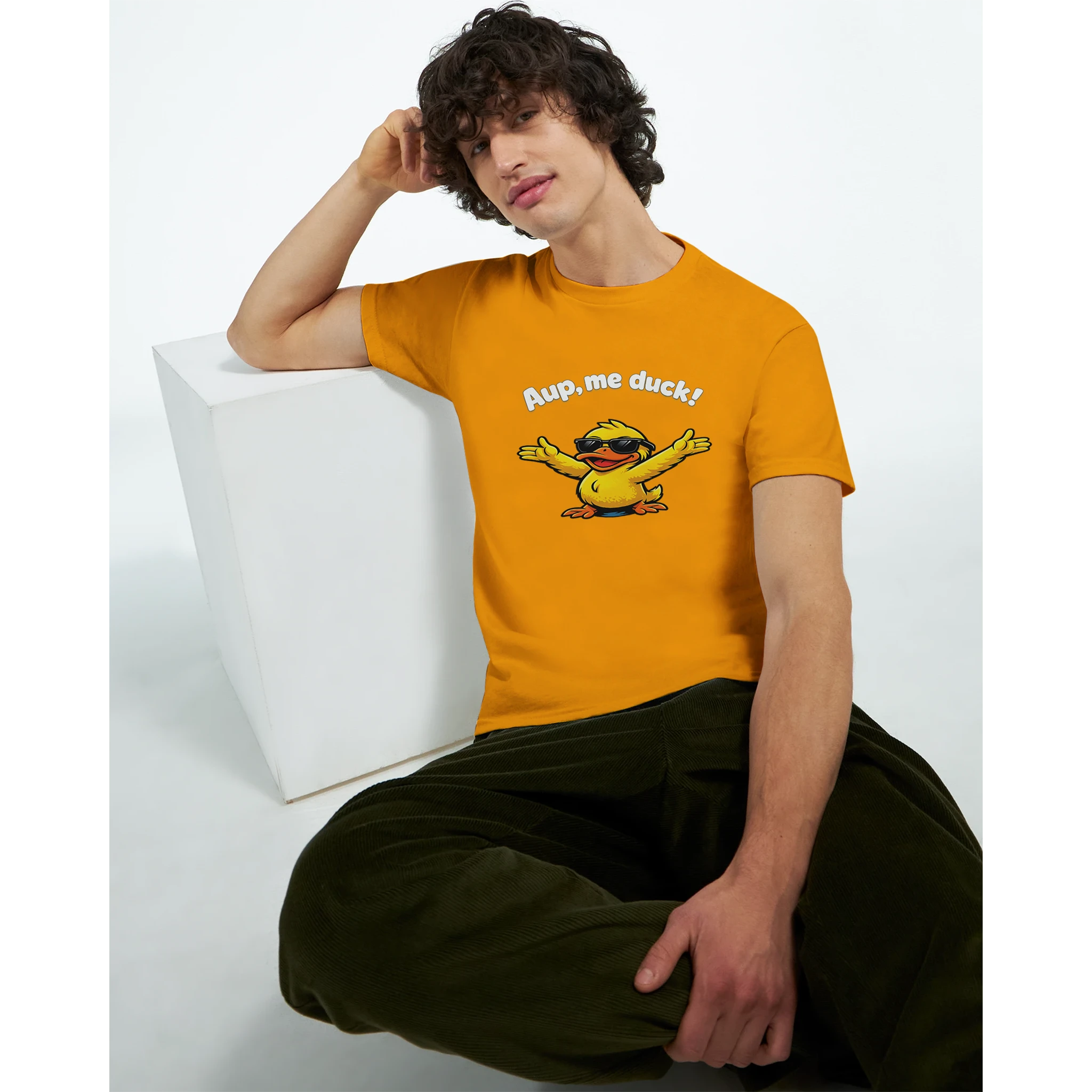 Unisex yellow crewneck T-shirt with duck graphic and 'Aup, me duck!' print, worn