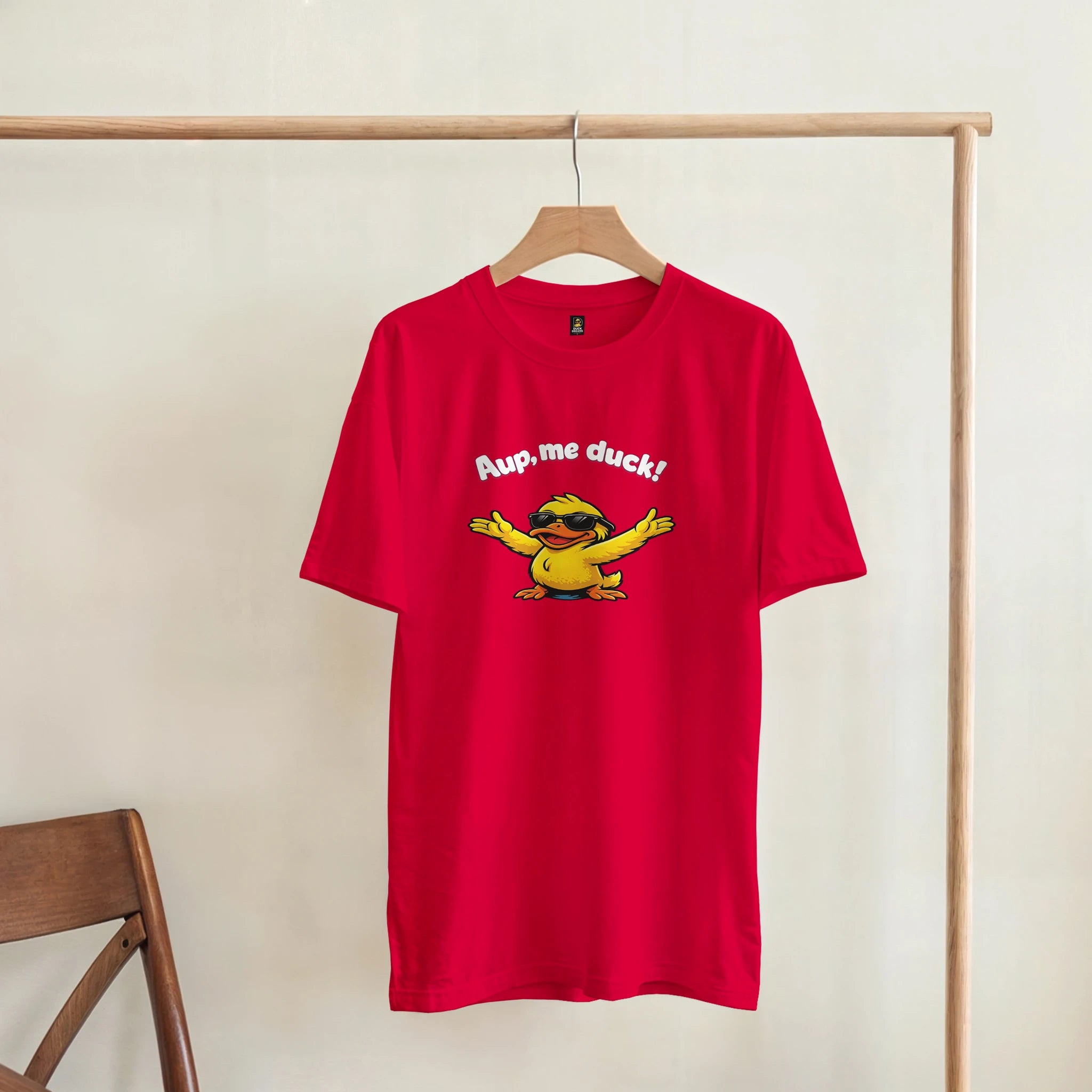 Unisex red crewneck T-shirt with duck graphic and 'Aup, me duck!' print
