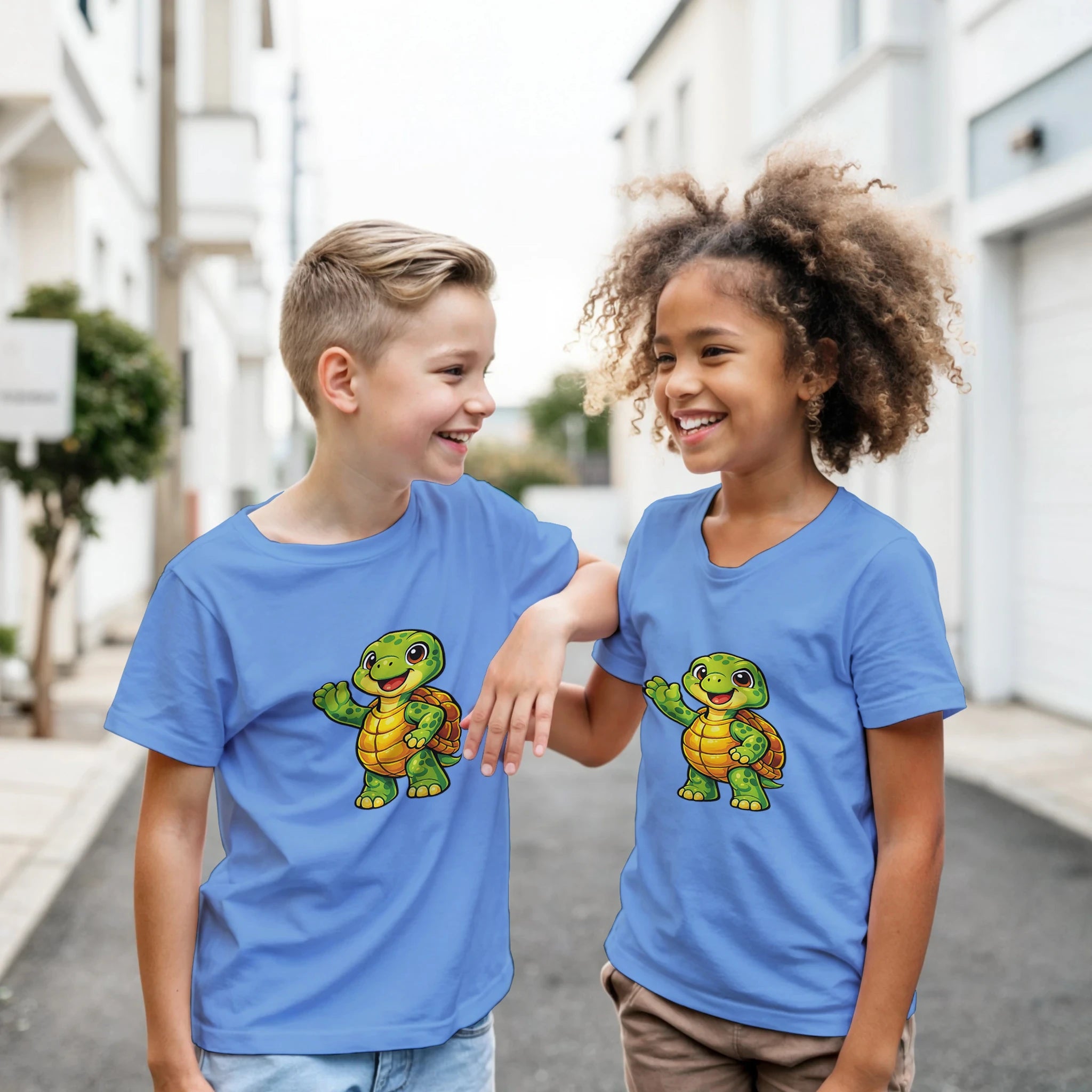 Kids turtle graphic T-shirt, carolina blue with cartoon turtle front print.